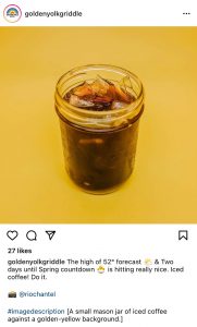 Photo of Golden Yolk Instagram photo featuring their iced coffee. In the caption, they use hashtag image description to describe the photo.